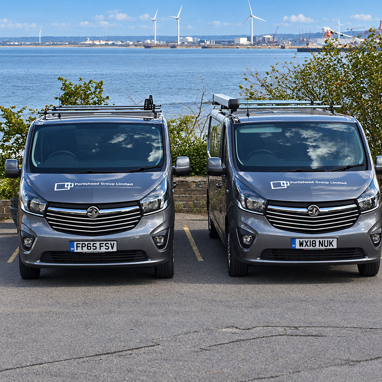Two Portishead Group vans parked by the harbour